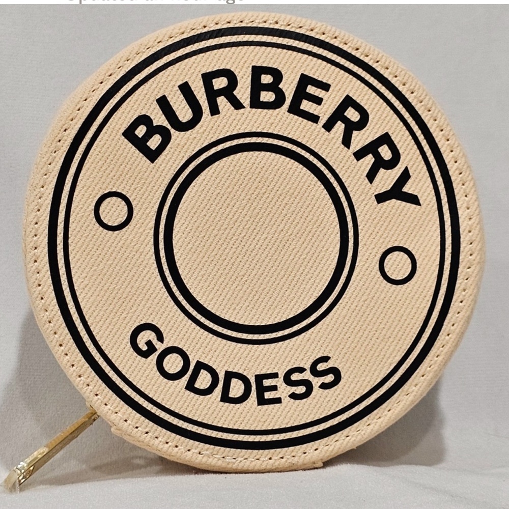 - Burberry Goddess travel jewelry case clutch bag circle.